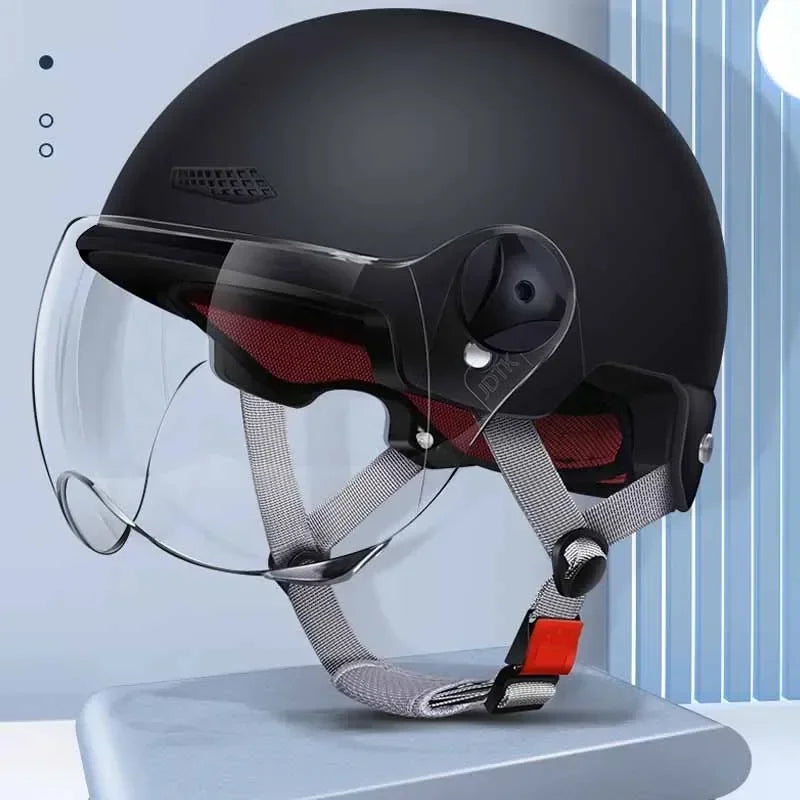 Sleek motorcycle helmet with adjustable straps, shield, and ventilation system for a safe and comfortable riding experience.