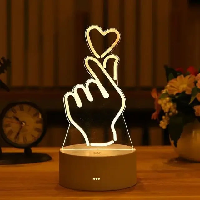 Romantic 3D heart-shaped LED lamp for home decor, children's night light, or Valentine's Day bedside table.