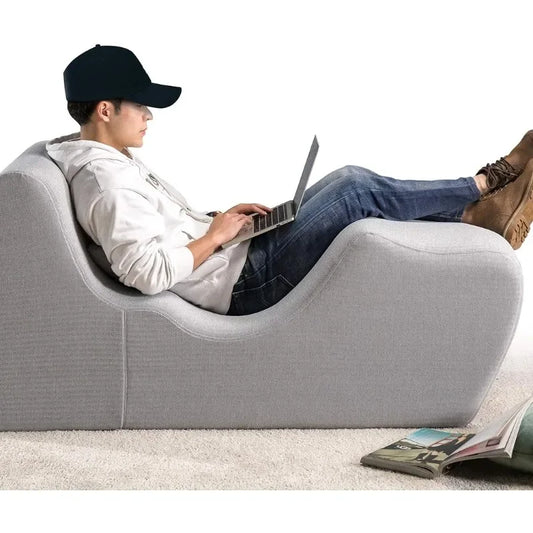 Ergonomic zero gravity chaise lounger with pillow for comfortable relaxation while using laptop