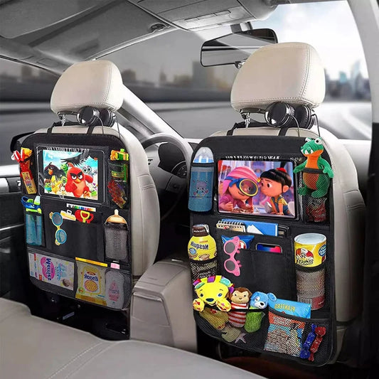 Colorful cartoon-themed backseat organizer with touch screen tablet holders and storage pockets attached to car seats, providing convenient storage and entertainment for passengers.