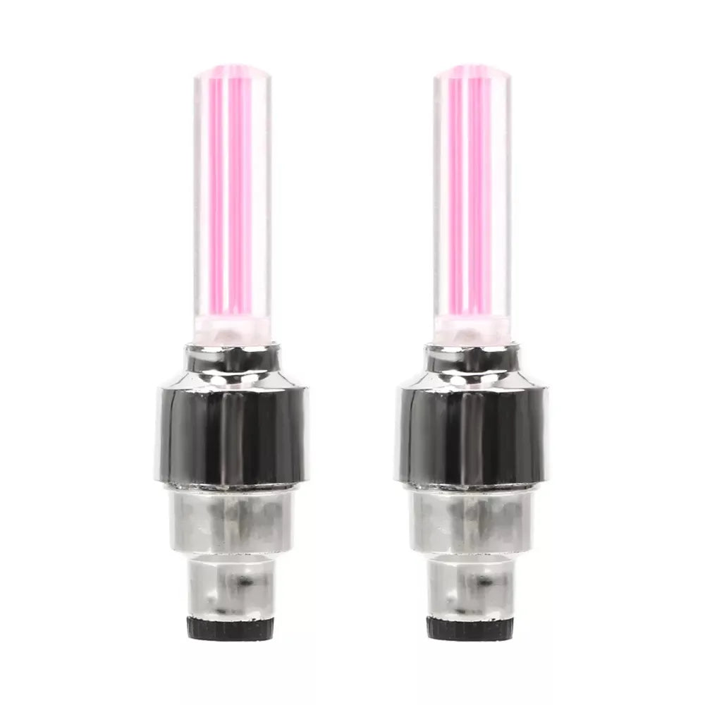 Pair of pink LED car wheel valve cap lights with decorative neon lamp for bicycle, motorcycle, and vehicle tire customization and safety.