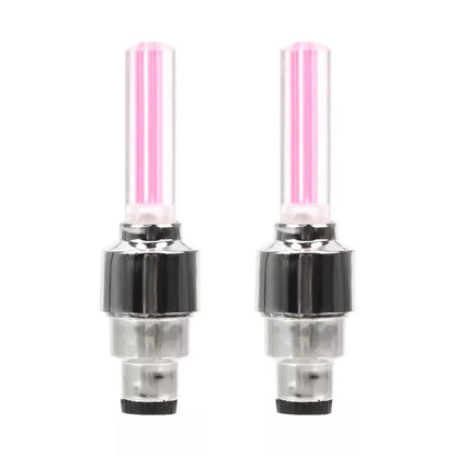 Pair of pink LED car wheel valve cap lights with decorative neon lamp for bicycle, motorcycle, and vehicle tire customization and safety.