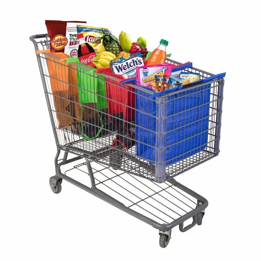 Supermarket shopping cart filled with assorted grocery items including canned goods, snacks, and fresh produce.