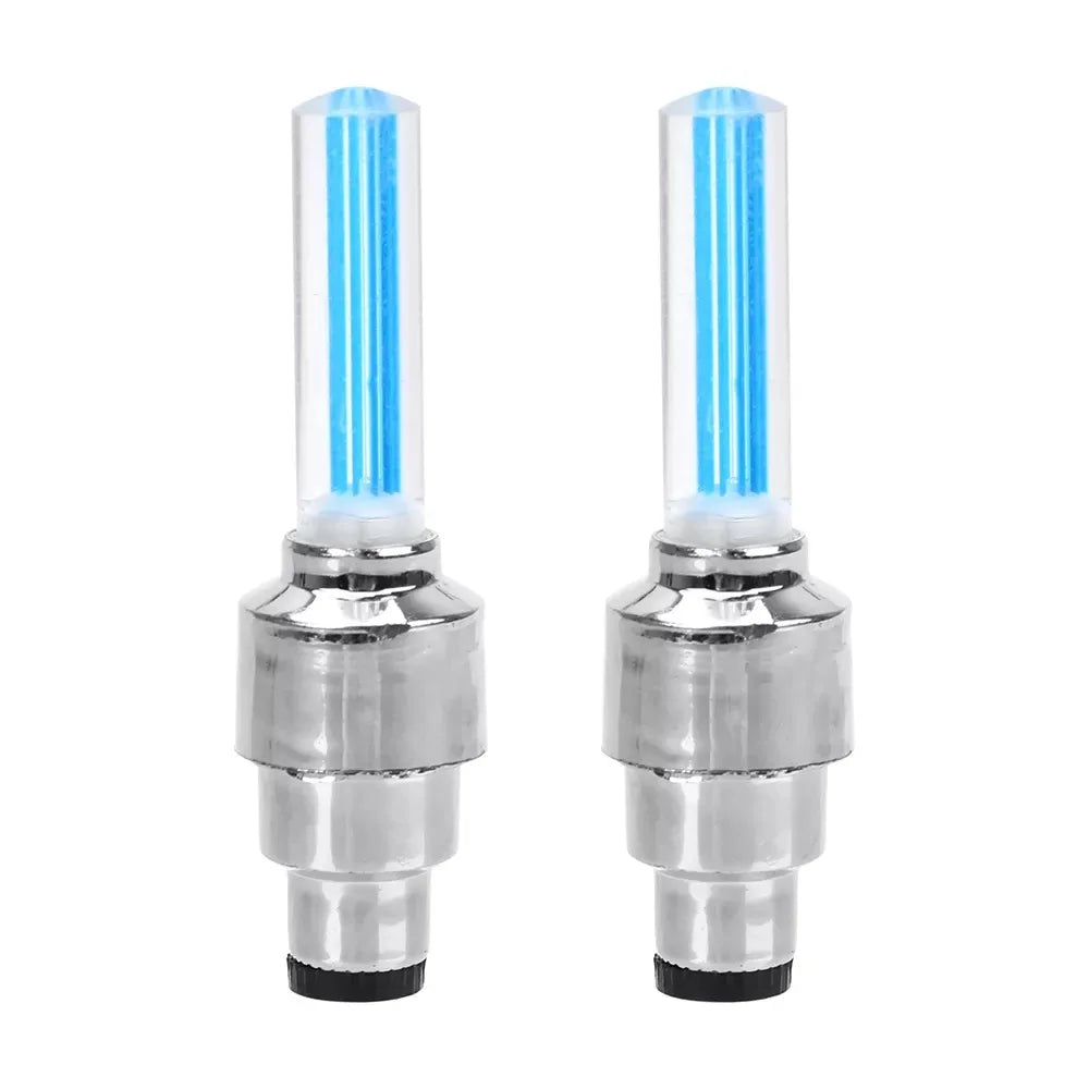 Pair of LED car wheel lights for motorcycle or bicycle. Blue decorative tire valve caps with flashing neon lamp function to enhance vehicle appearance and provide visibility. Made of durable chrome material, these tire valve caps can be easily installed on tire valves.