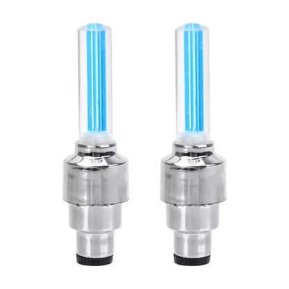 Pair of LED car wheel lights for motorcycle or bicycle. Blue decorative tire valve caps with flashing neon lamp function to enhance vehicle appearance and provide visibility. Made of durable chrome material, these tire valve caps can be easily installed on tire valves.