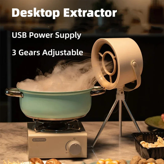 Portable exhaust fan with USB power supply for small kitchen use. Features 3 adjustable gears to control suction power. Designed for desktop or countertop barbecue and cooking tasks.