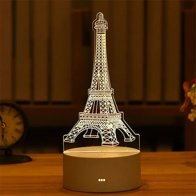 Illuminated 3D acrylic Eiffel Tower lamp, romantic night light for home, children's bedroom, and party decor.