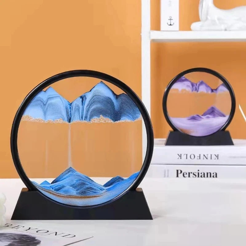 Captivating 3D moving sand art display with desert and mountainous landscapes in glass round frame, creating a mesmerizing flow of sand for office or home decor.
