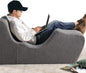 Comfortable zero gravity chaise lounger for relaxation, with ergonomic design and pillow support.