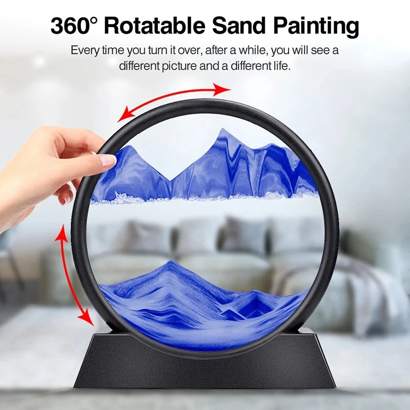 Rotating sand art display with flowing blue swirls, creating a mesmerizing deep sea sandscape with ever-changing scenery inside a round glass frame.