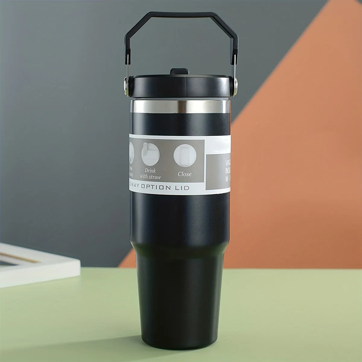 Sleek stainless steel insulated cup with two-tone design and convenient handle, perfect for keeping beverages hot or cold on the go.