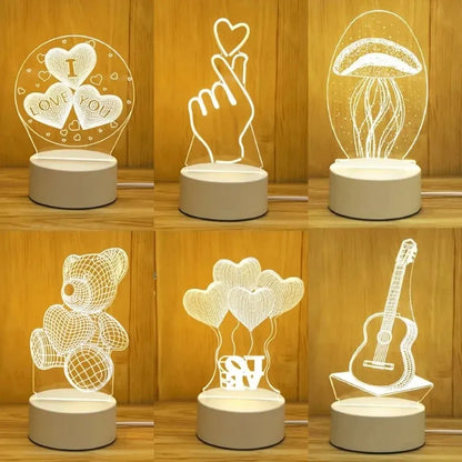 Assortment of romantic 3D LED lamps on wooden shelves, including heart, hand gesture, jellyfish, balloons, and guitar designs, creating a warm, festive atmosphere perfect for home decor, children's rooms, or Valentine's Day celebrations.