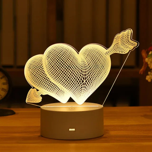 Romantic 3D heart-shaped LED lamp with arrow decoration for home, children's room, or romantic bedside decor.